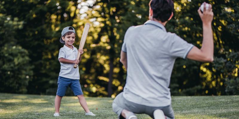 kid playing with father